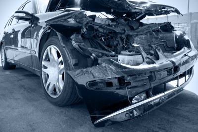 the front of a car severely damaged in a car accident