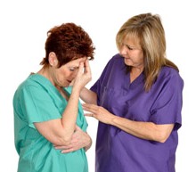 one nurse consoling another